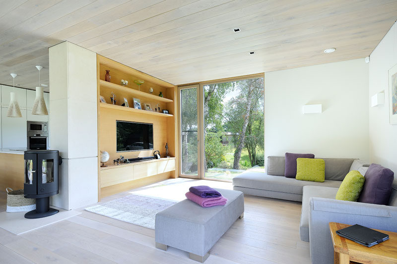 This space is filled with natural with oak, limestone and white paneled walls.