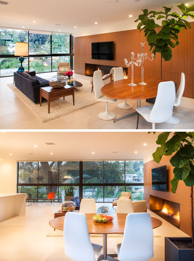 Next to the living area in this home is the dining area, with a circular dining table.