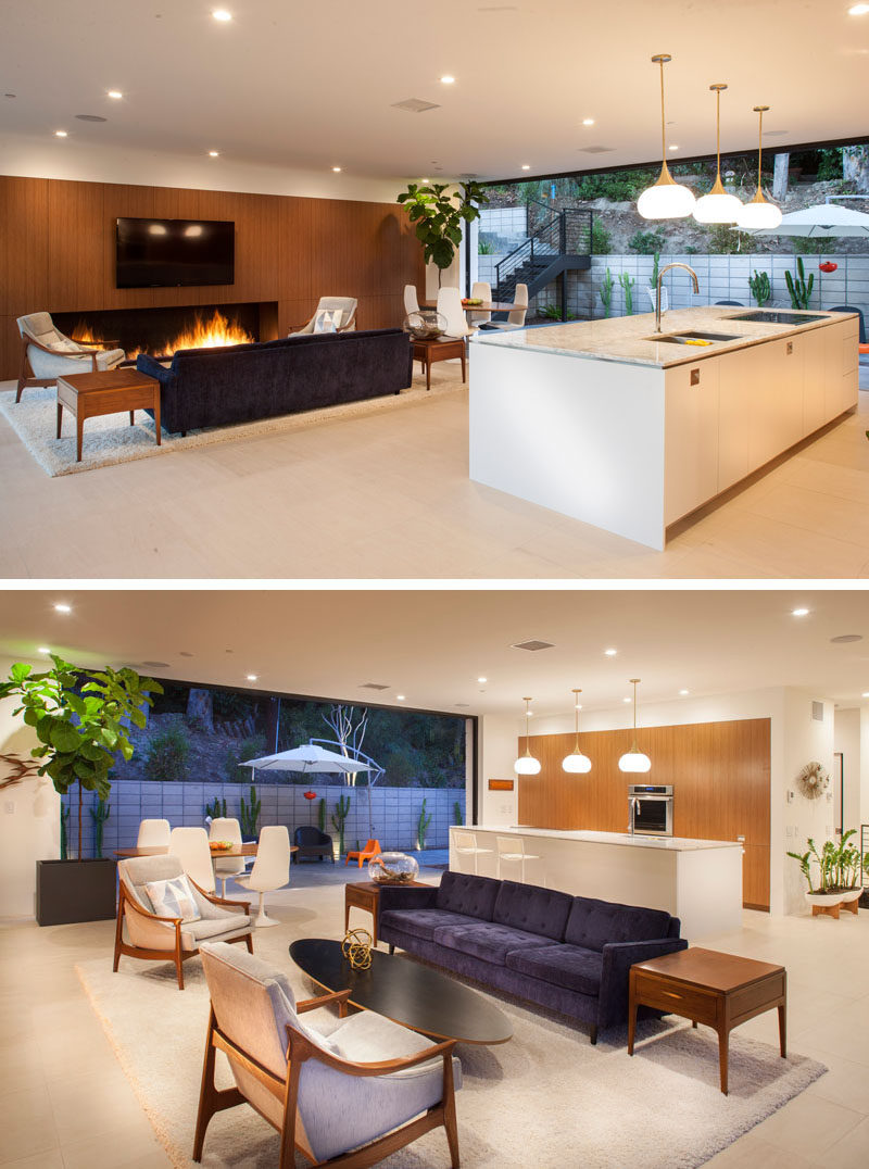 In this home, the kitchen, dining and living areas share the same space, that opens up to an outdoor space.