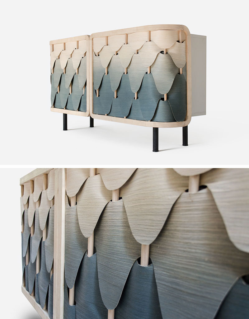 A Gradient Of Colorful Wood Veneers Cover This Cabinet