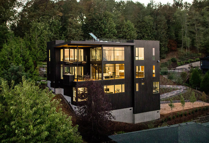 This home, located on a steep lot in Portland, Oregon, with views towards Mt. St. Helens and Mt. Rainier, has been designed for a family that loves music.