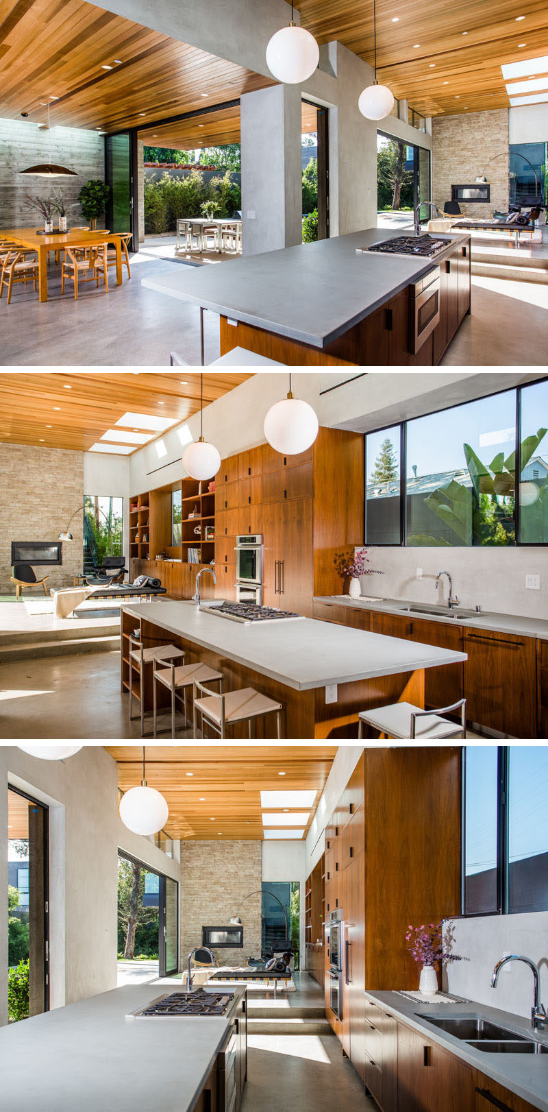In this kitchen, a light grey counter matches the concrete floor, and wooden kitchen cabinets flow through to the library area.