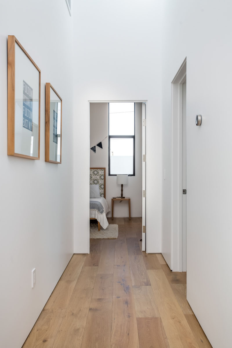 French oak flooring has been used in this hallway which also continues through to the bedrooms.