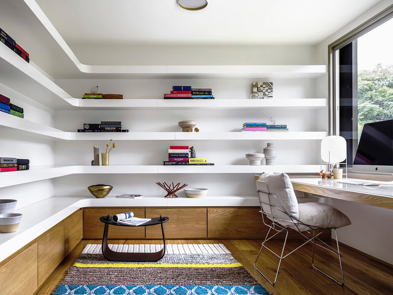 When installing shelves that fit into the corner, you might want to consider having custom shelves designed to fit your space perfectly. This also gives you the opportunity to have the corners rounded for a softer look in your space.