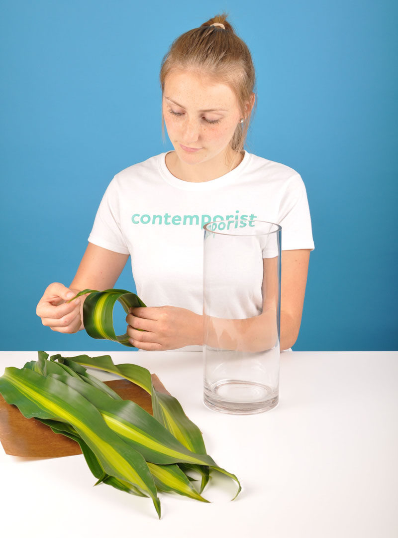 Flower Arrangement DIY - Line Your Vase With Leaves To Hide The Flower Stems