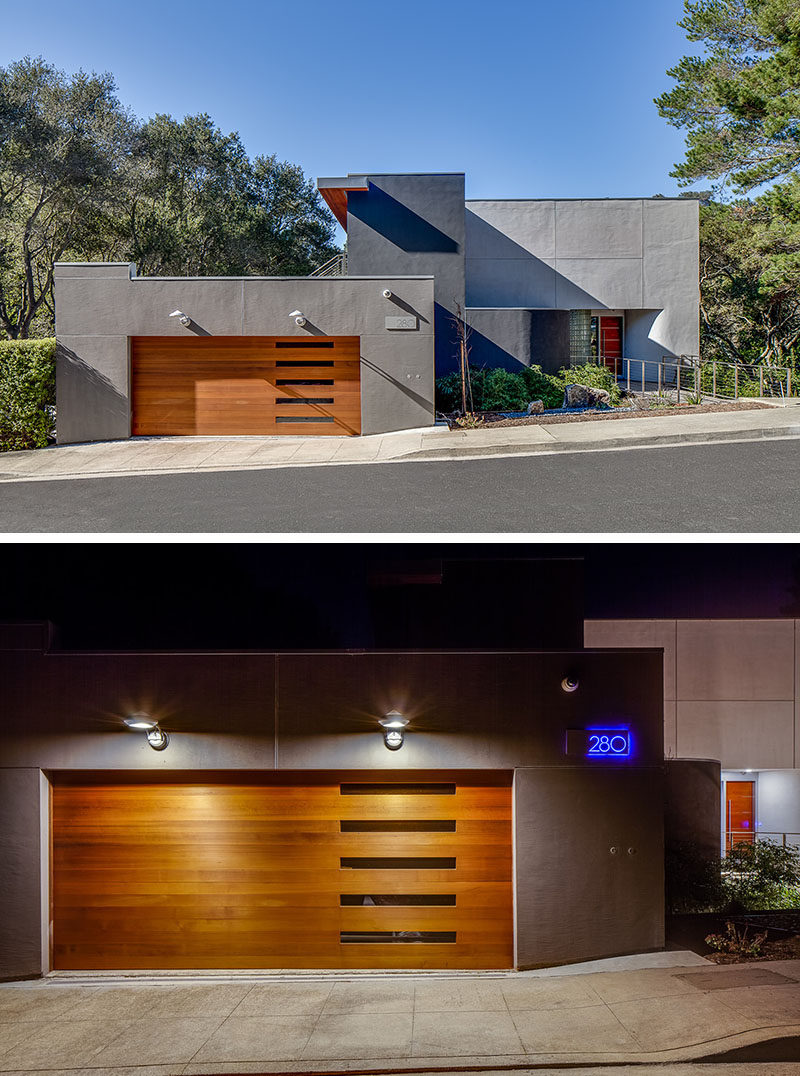 18 Inspirational Examples Of Modern Garage Doors // The five horizontal windows of this garage door give it a unique look while the lights above it give the front of the home added security.