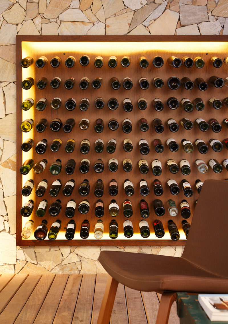 This backlit wall of wine storage featured in a bar in São Paulo, Brazil.