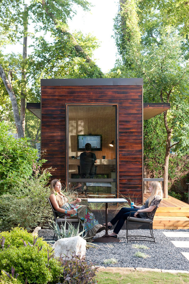 This 92 square foot backyard office covered in charred wood siding.