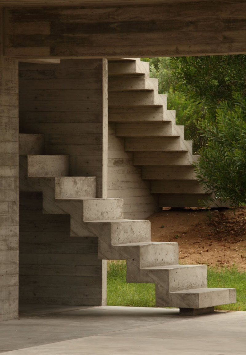 These concrete stairs guide you from the outdoor areas of the home to the inside spaces.