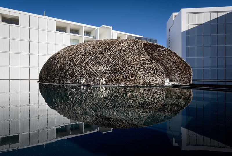 Surrounded entirely by water, made from thin strips of wood and seeming to float right on its surface is Restaurant Nido; one of the three world class restaurants at Mar Adentro Hotel, a five-star hotel designed by Miguel Ángel Aragonés in San José del Cabo, Mexico.