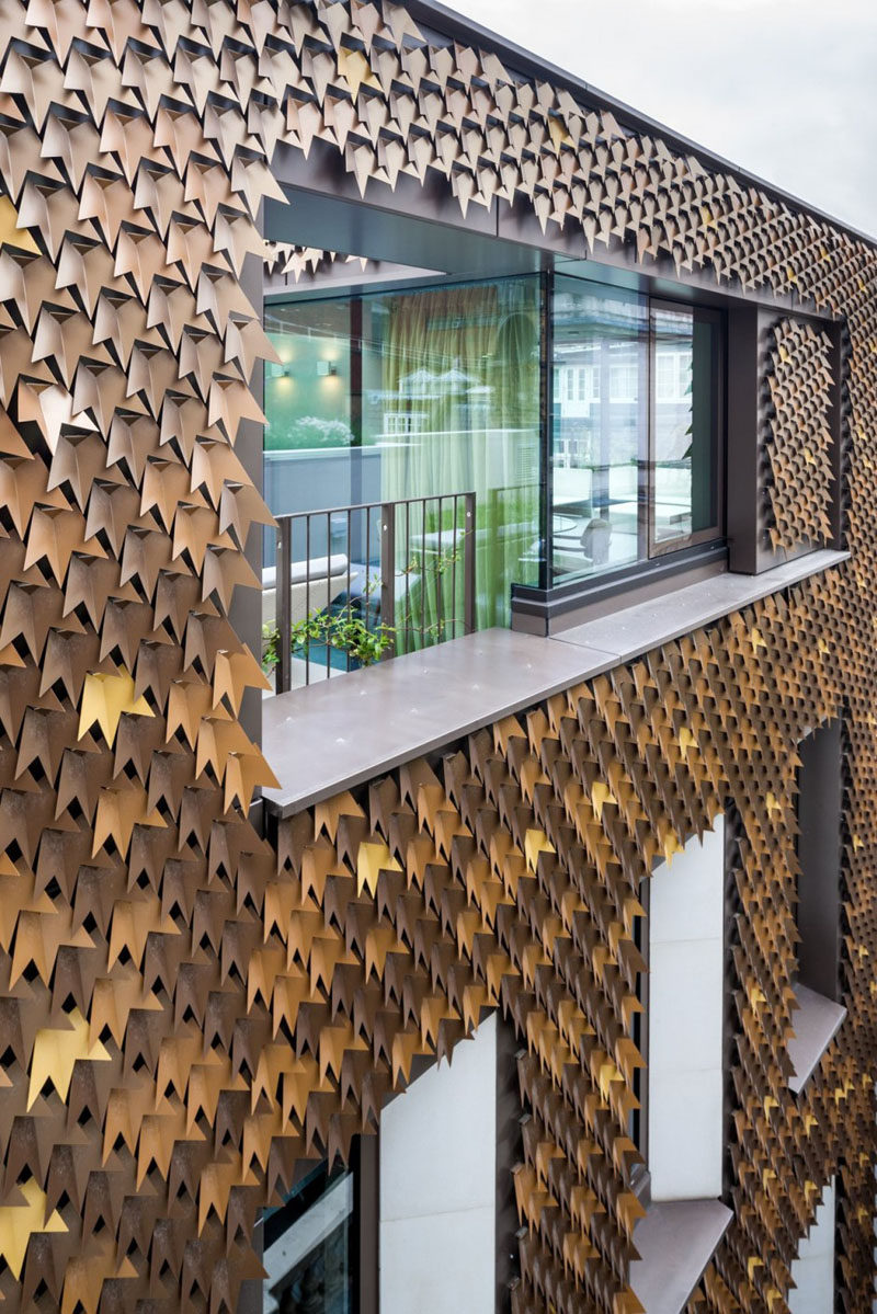 4080 folded aluminum leaves cover the facade of this home in London.