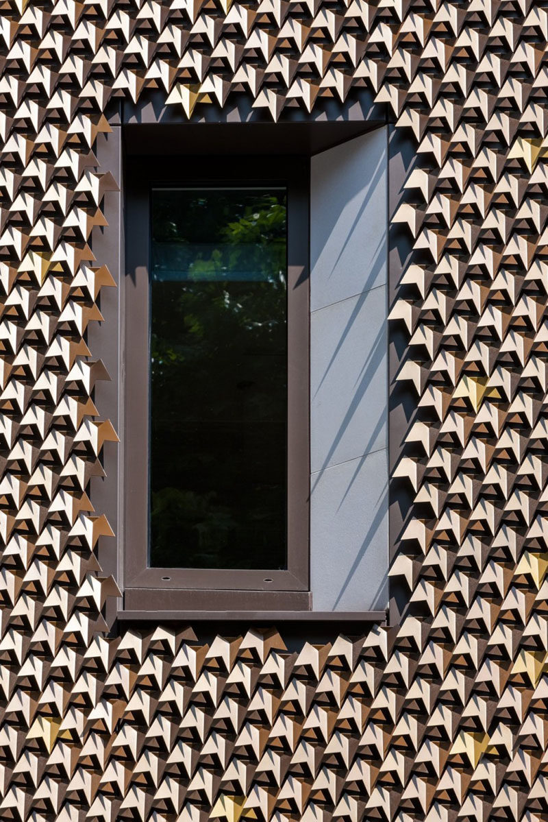 4080 folded aluminum leaves cover the facade of this home in London.