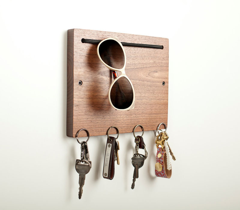 16 Key Holders To Keep You Organized // This modern wooden key holder has a spot to hang your sunglasses and your keys.