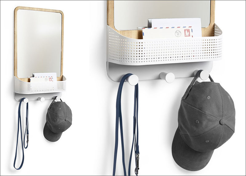 16 Key Holders To Keep You Organized // This wall hook has a mirror, a basket, and a set of hooks ideal for hanging keys, hats and other lightweight things.