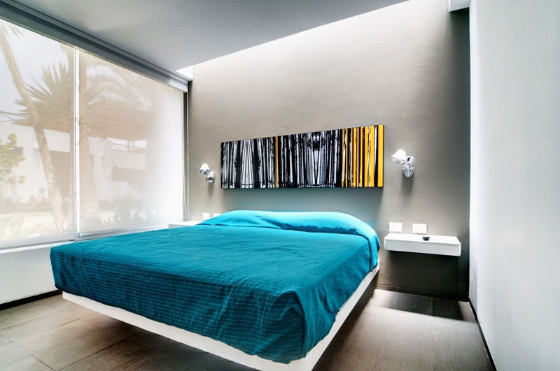 9 Different Ideas For Adding A Nightstand To Your Bedroom // Floating --- Add a futuristic flair to your bedroom with nightstand that seem to float right next to your bed.