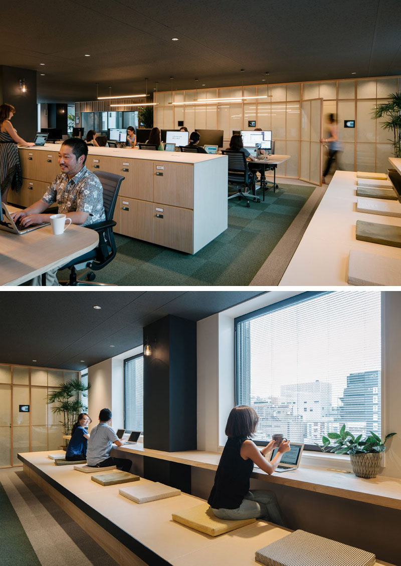 Closed off meeting rooms in this office open to this workspace, that has window seats for looking out at the view while you work.