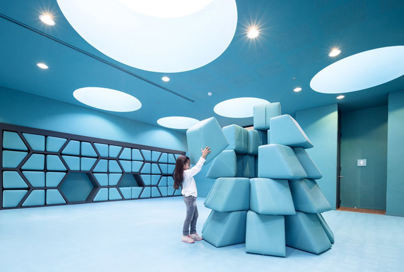 Brightly Colours Walls In This School Are Filled With Cushioned Seats And Reading Nooks