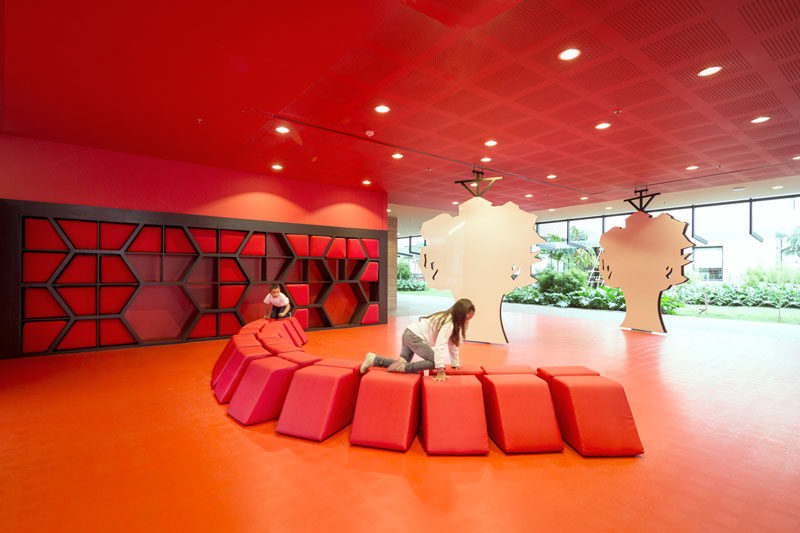 Brightly Colours Walls In This School Are Filled With Cushioned Seats And Reading Nooks