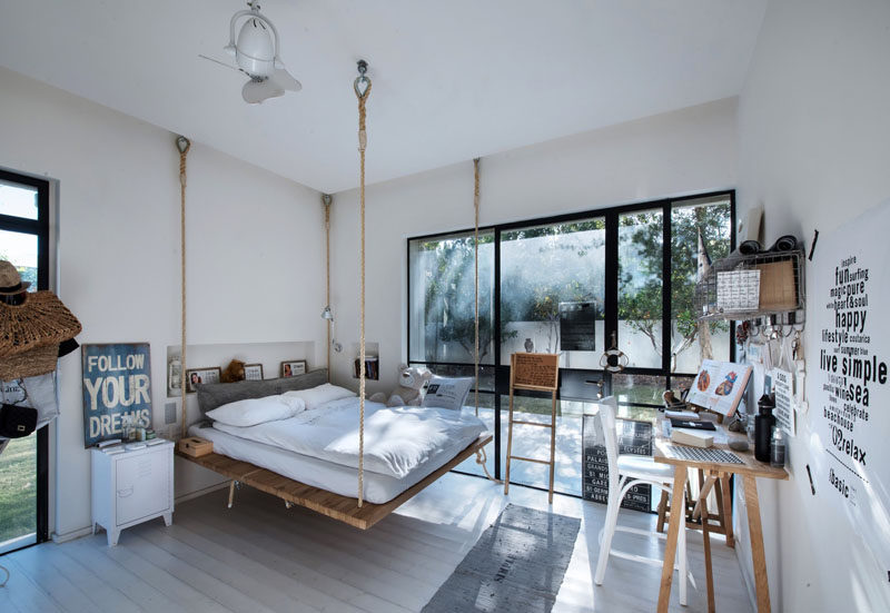 14 Inspirational Bedroom Ideas For Teenagers // A suspended bed and a neutral pallet in this teen bedroom makes for an inspiring space that can easily be changed as tastes come and go.