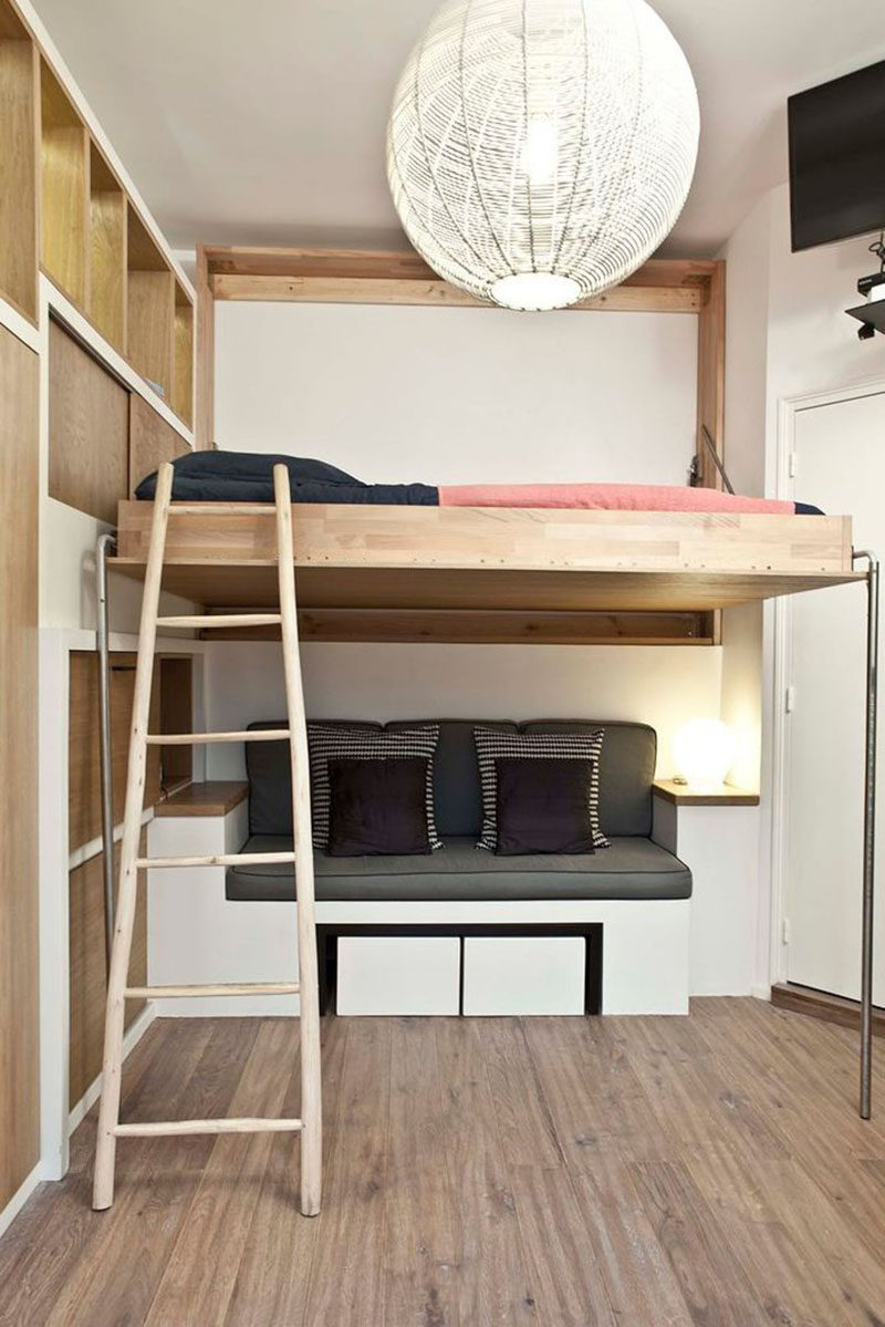 14 Inspirational Bedroom Ideas For Teenagers // Loft beds don't just have to go above desks - they can over pretty much anything, as seen in this bedroom where the bed sits above a seating area and can be folded into the wall when not in use.