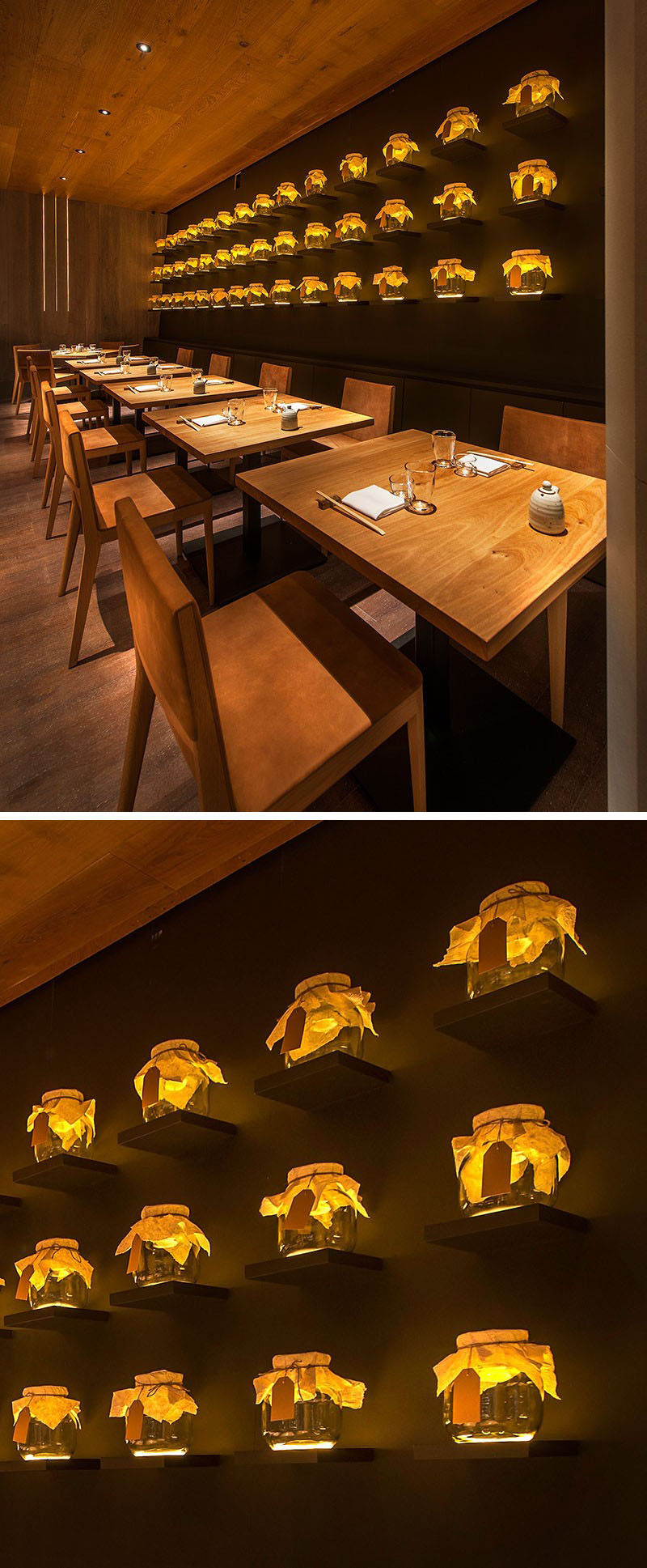 A restaurant accent wall made from small shelves that have mini lanterns on them.