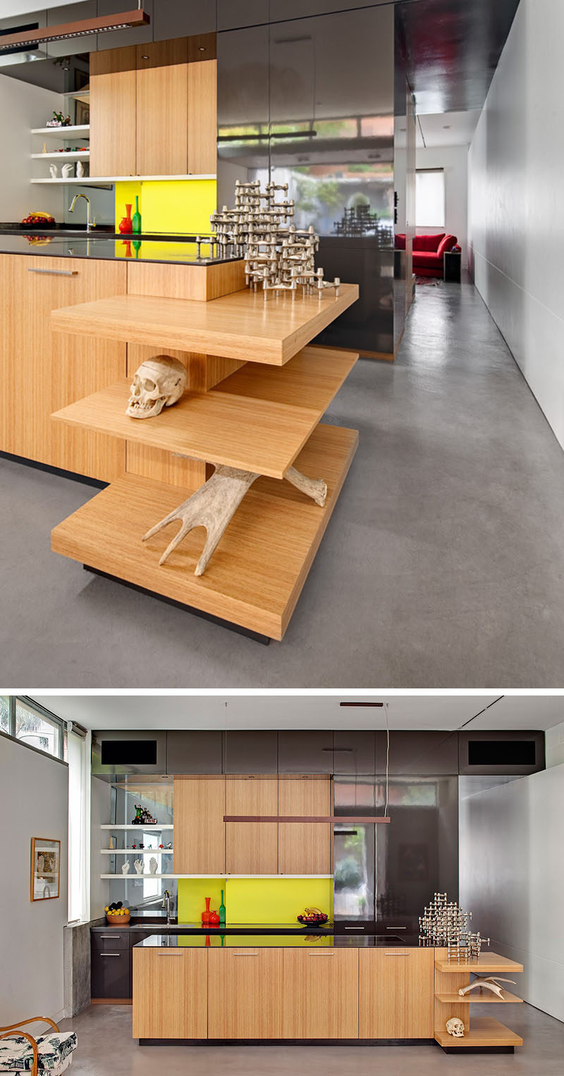 SHELVING IDEA - Shelves That Wrap Around Corners // Three shelves wrap around the island in this kitchen to display decor and individualize the space.