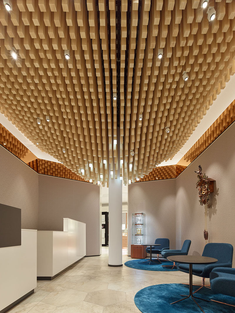 Modern Ceiling Design Idea - 4362 Square Wooden Dowels Cover The Ceiling Of This Watch Showroom