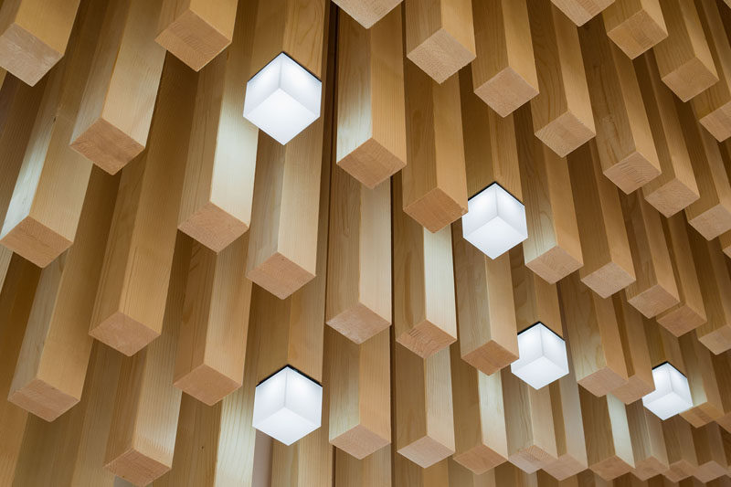 Modern Ceiling Design Idea - 4362 Square Wooden Dowels Cover The Ceiling Of This Watch Showroom