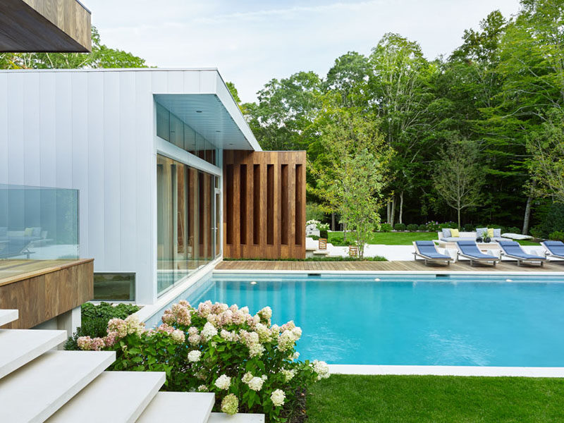 This home features white walls, lots of glass and touches of wood.