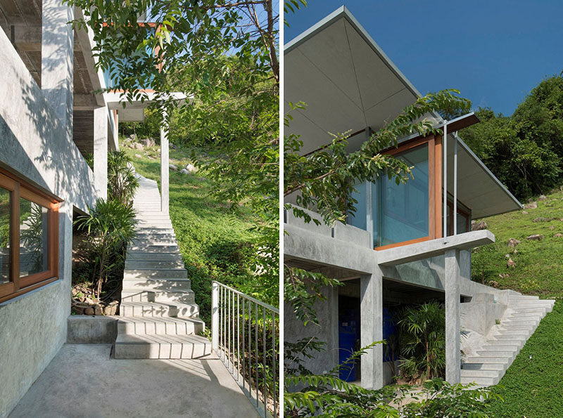 Outdoor concrete stairs lead you between the different levels of this home.