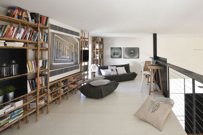 This home has a lofted reading space with bamboo shelving.