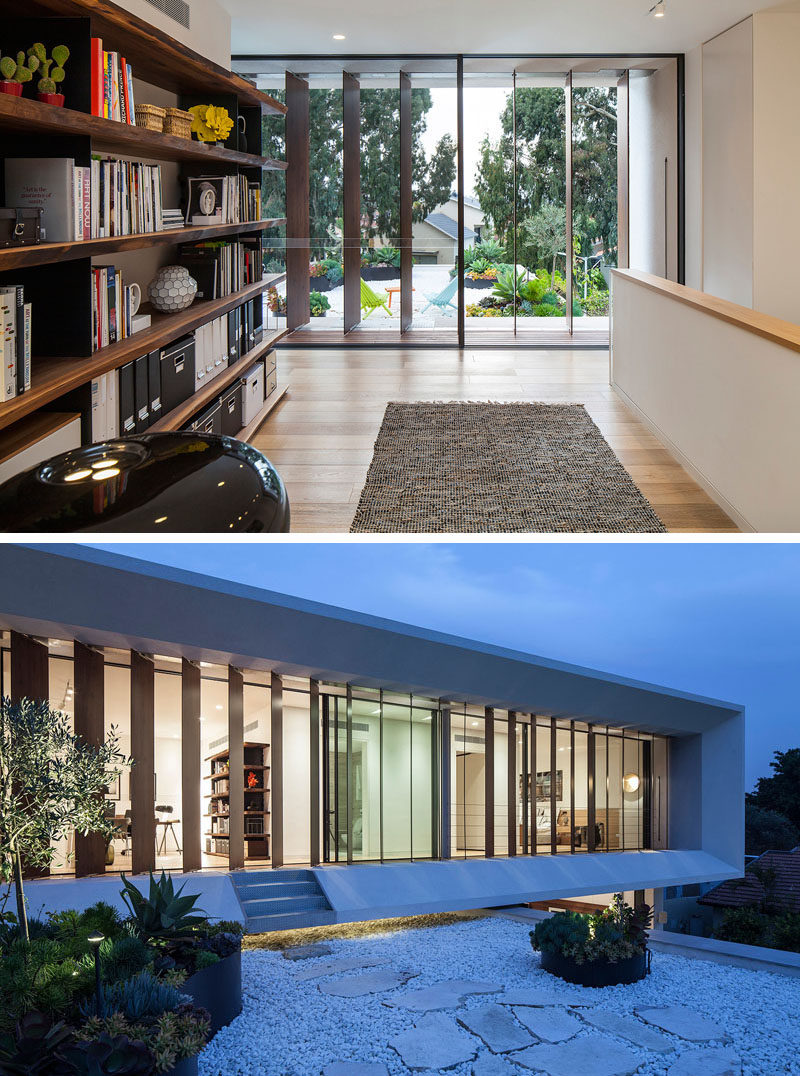 In the upper level of this home there's access to a rooftop garden off the master bedroom. White rocks and stepping stones have been used as well as planters made from steel containers, all making the garden easy to maintain.