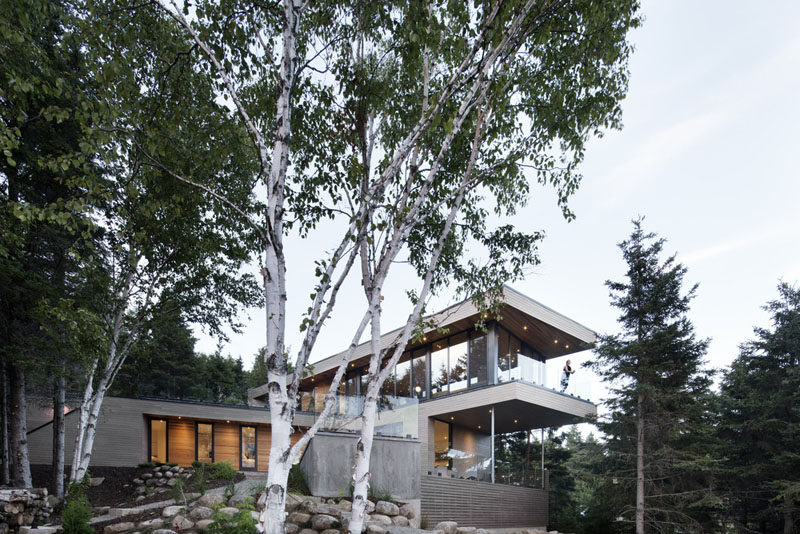 This home in Cap-à-l'Aigle, Quebec, and designed by Bourgeois / Lechasseur architects, is named the 'Altaïr House'. Altaïr means "The Flying Eagle", which makes sense when the house is designed in the shape of a 'V', and has long facades that are suspended over the surrounding nature.