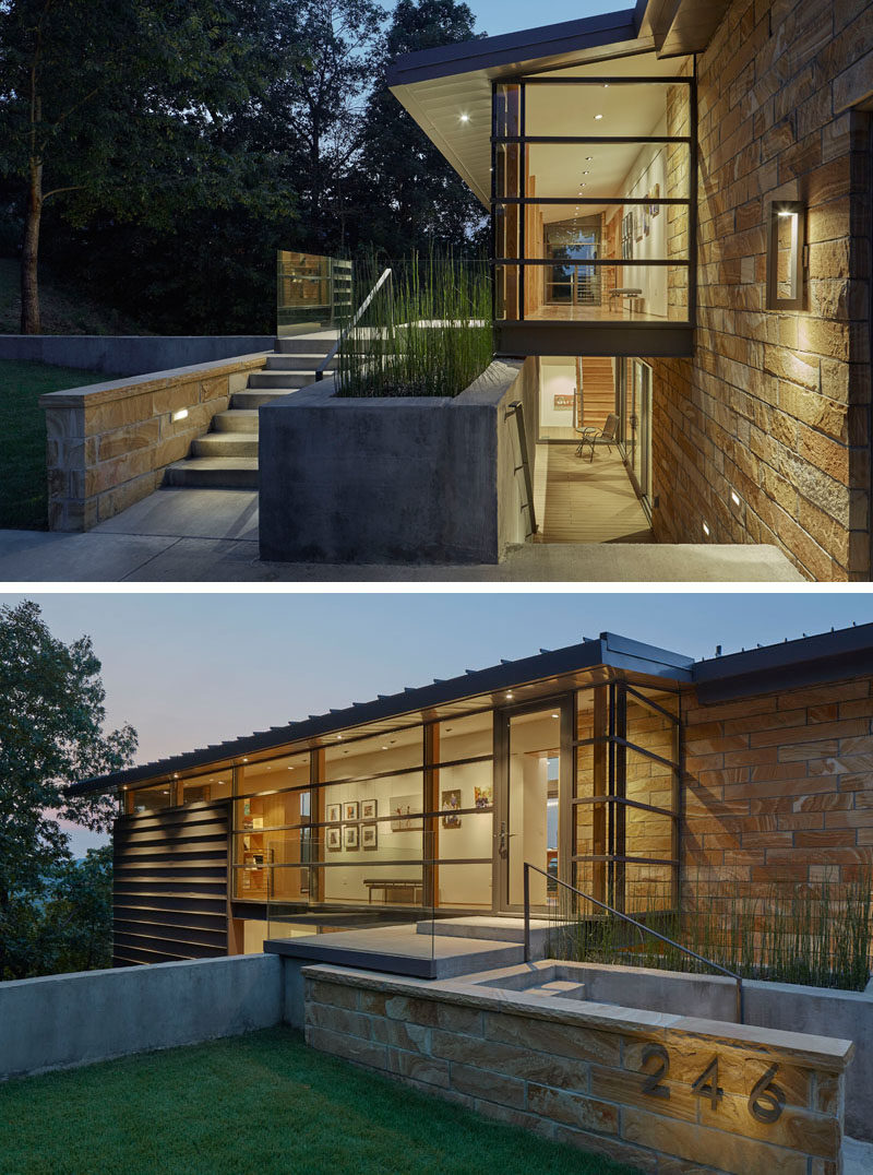 The foyer of this home is like a mini art gallery, but at the same time it provides the lower level of the home with a covered outdoor space.