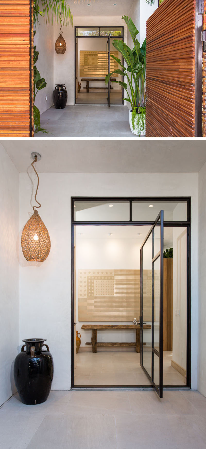 At the entrance to this Californian home, there's a glass pivoting door with black frame.