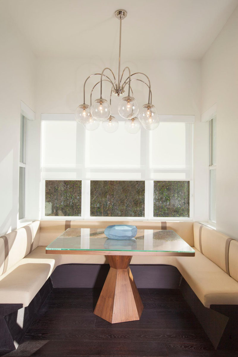 Dining Room Idea - Create A Built-In Dining Nook // Clean lines and a custom-built dining nook fill this space that can quickly go from the place where you have breakfast to the center of a dinner party. #DiningNook #BuiltInDiningNook #BanquetteSeating #DiningRoom