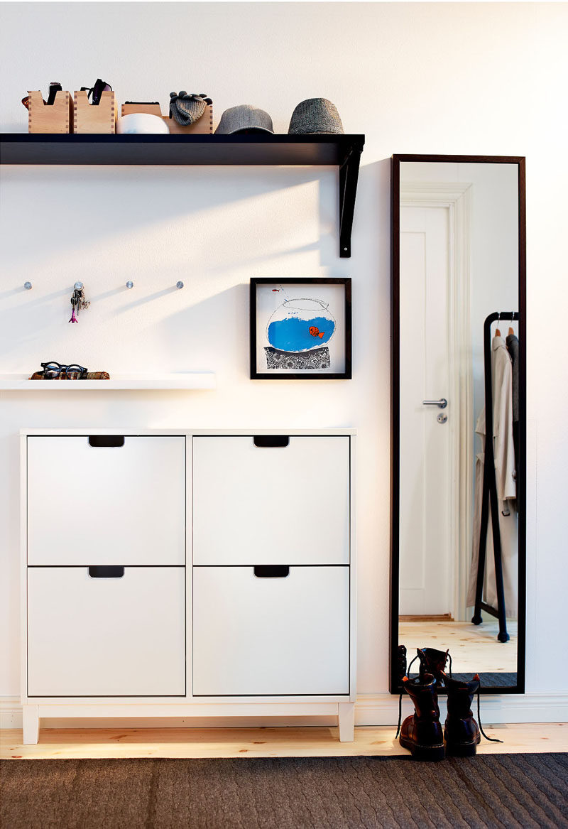 Interior Design Idea - What To Include When Creating The Ultimate Entryway // Shoe Storage -- Keep shoes under control with cabinets, racks or bins, so that you and your guests don't trip over them as you walk in the door and to keep your entryway always looking tidy.