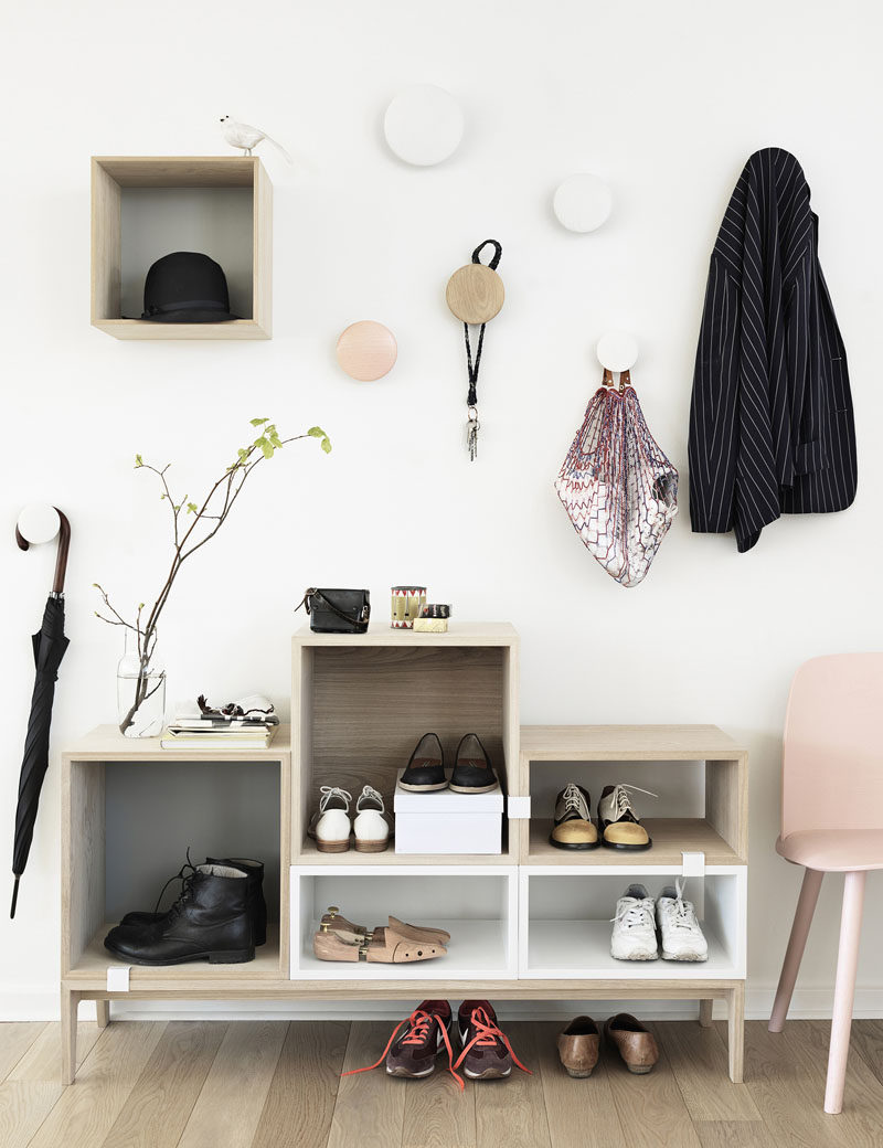 Interior Design Idea - What To Include When Creating The Ultimate Entryway // Shoe Storage -- Keep shoes under control with cabinets, racks or bins, so that you and your guests don't trip over them as you walk in the door and to keep your entryway always looking tidy.