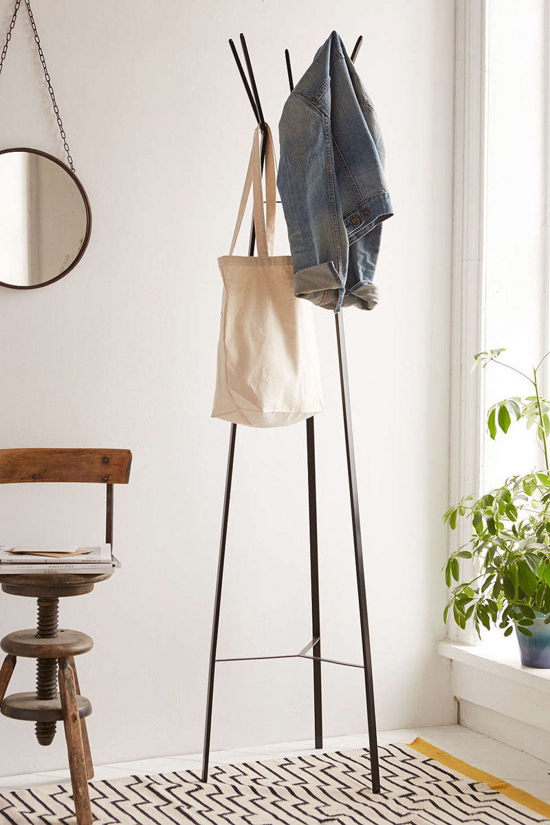 Interior Design Idea - What To Include When Creating The Ultimate Entryway // Hanging Space -- Use hooks, hangers, or racks to keep your outer wear together at the front door in an organized and stylish way.