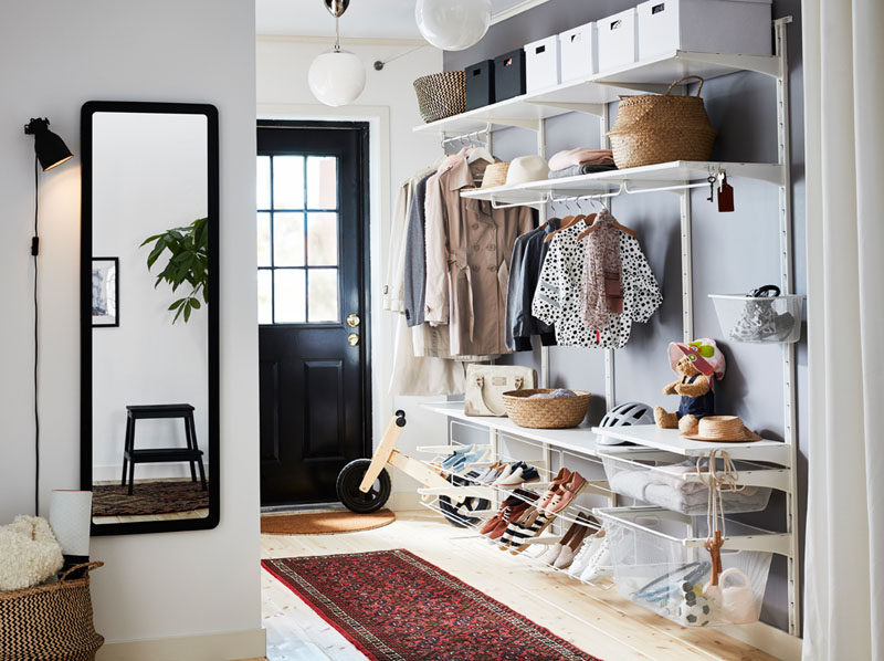 Interior Design Idea - What To Include When Creating The Ultimate Entryway // Hanging Space -- Use hooks, hangers, or racks to keep your outer wear together at the front door in an organized and stylish way.