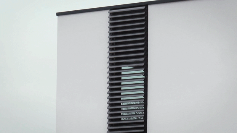 These window shutters open vertically instead of horizontally and provide a shade from the sun, and protection from intruders and the wind.