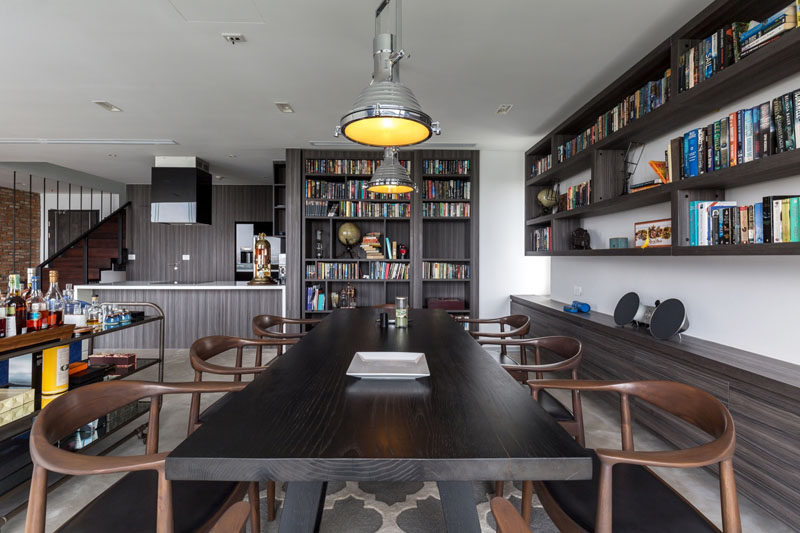 A secret guest bedroom/home office is hidden behind a bookshelf in this home.