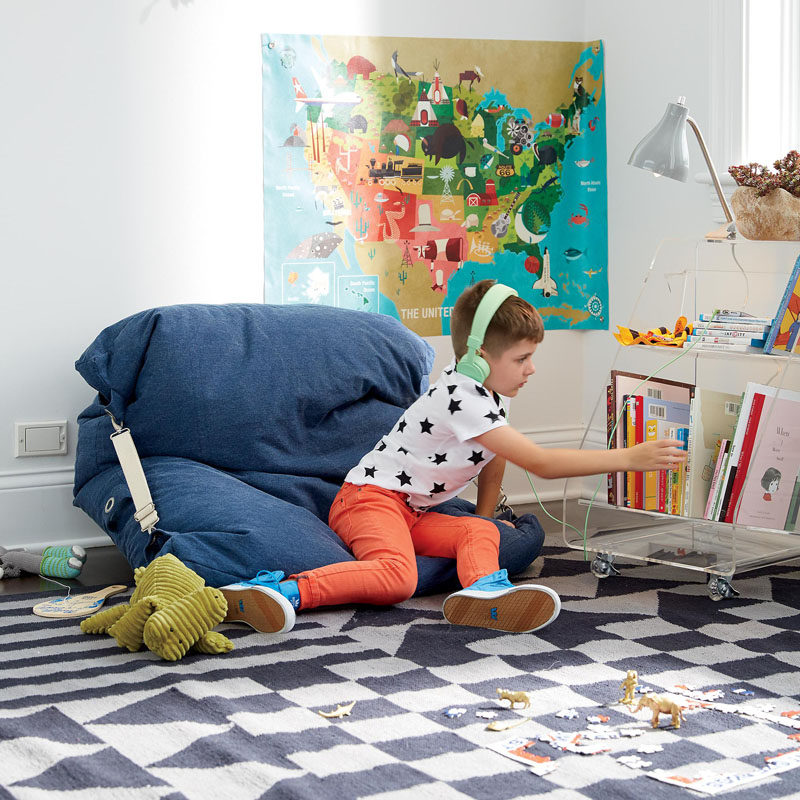 Interior Design Idea - 11 Essentials For Kids Homework Stations // Add some comfort -- Include a pouf or bean bag chair somewhere close to the study area to provide a cozy spot for you kids to read in and they'll be much more likely to enjoy their books.