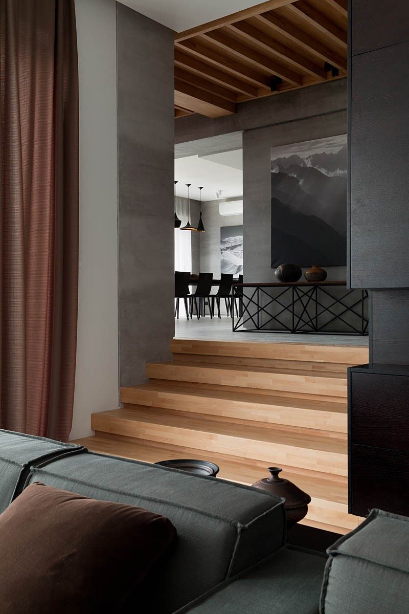 A palette of gray and walnut completes the redesign of this family home.