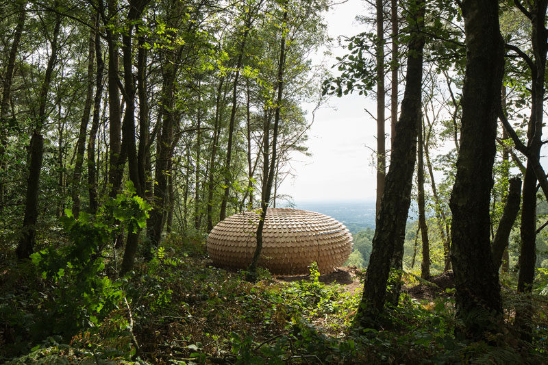 'Perspectives' is the first permanent architectural installation designed by Giles Miller Studio. The installation is covered in cedar shingles with messages etched into them.