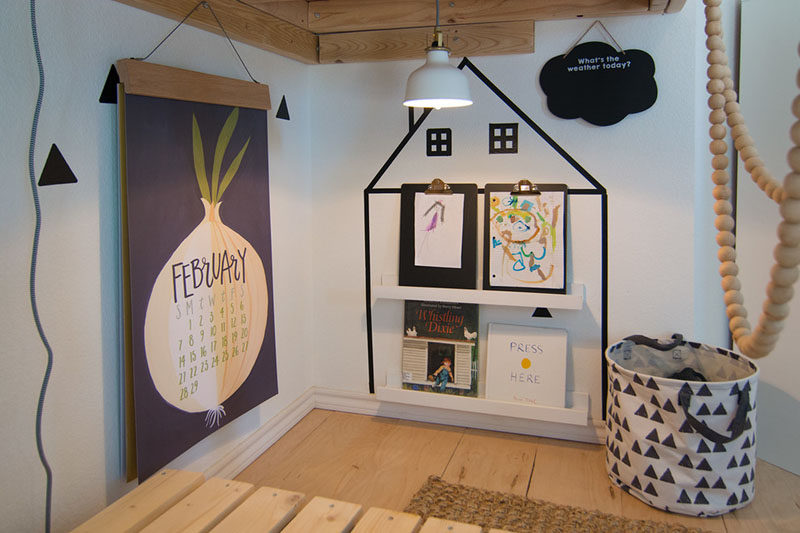 Maximizing space in kids room is always important and tucked away under the loft bed in this kids bedroom, is a little creative kids nook with hanging reading light and a book ledge.