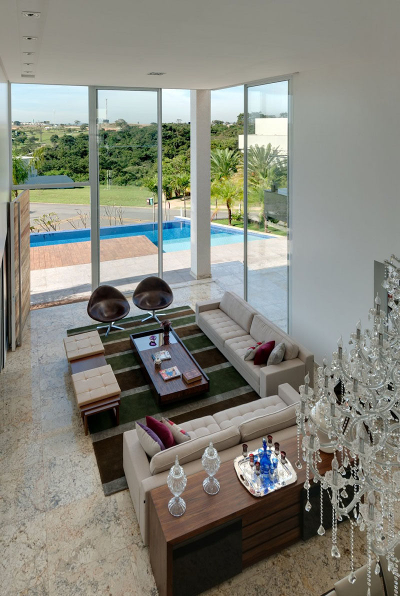 15 Living Room Layouts From Above // The oversized rug used in this living room softens the space and creates a designated living area.