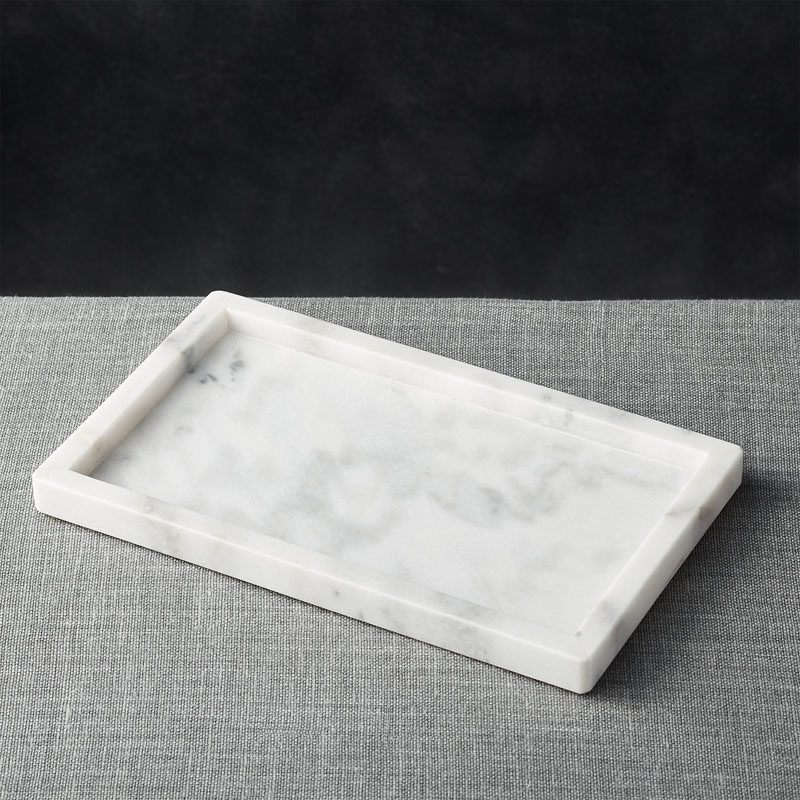 Office Decor Idea - Add A Touch Of Marble // Keep all of your important things gathered in one place with this elegant marble tray. It will help you make sure that you don't lose pens or pencils and will help make your desk feel all the more organized.