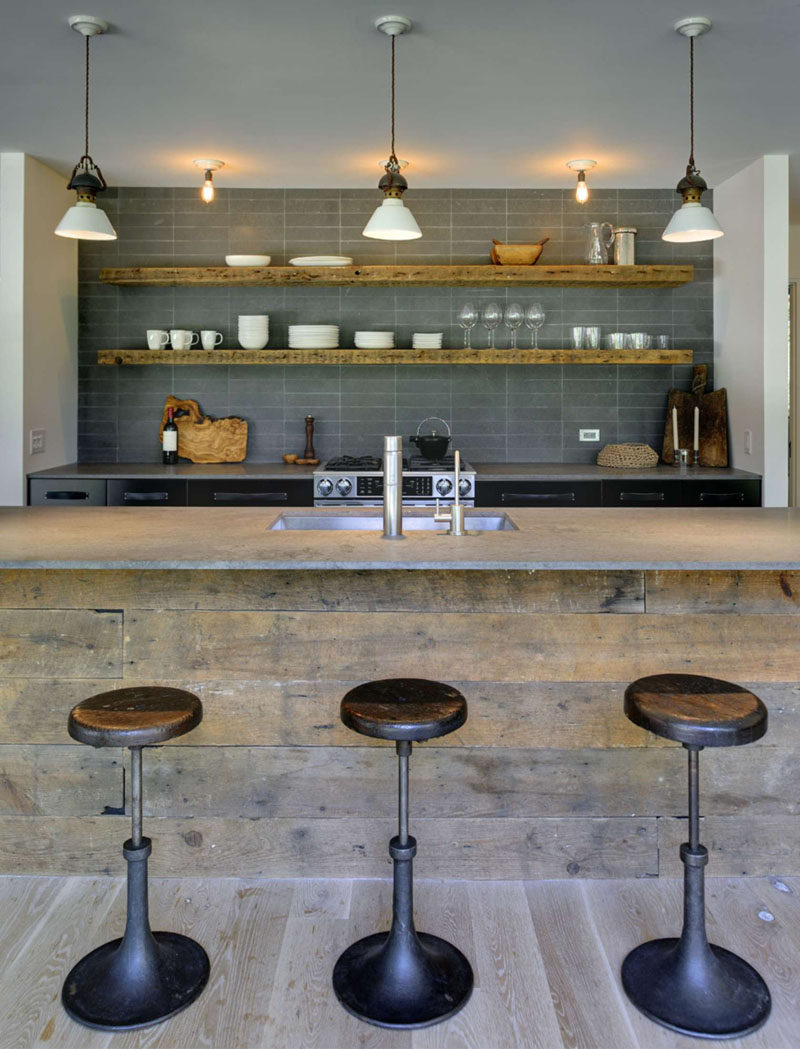 Kitchen Design Idea - Open Shelving (19 Photos) // Long wood floating shelves mixed with a concrete countertop creates a rustic yet contemporary feel.