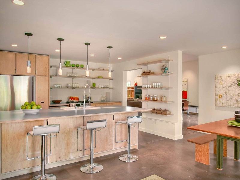 Kitchen Design Idea - Open Shelving (19 Photos) // Open shelving above the work space and on the wall to the side makes this kitchen easy to navigate.